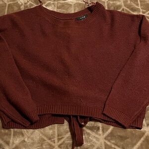 Deep red sweater with tie up open back